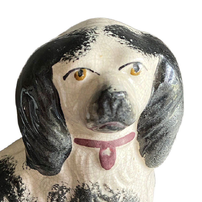 early victorian black and white dog figurine with pink collar detil of head