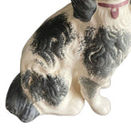 early 19th century black and white Staffordshire with pink collar bottom leg away and tail detail