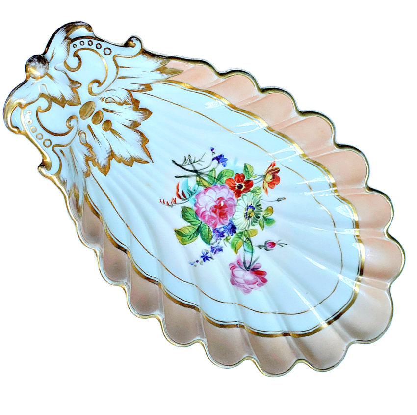 Exquisite unmarked Vieux Paris shell dish, hand-painted floral bouquet, apricot-pink rim, and gilt accents. Decorative, collectible 19th-century French porcelain.