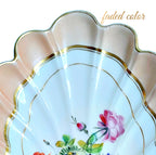 Vieux Paris shell dish, with hand-painted apricot-pink rim, and gilt accents. Showing the scalloped detiail.