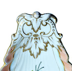 Exquisite Vieux Paris shell dish with gilt accents, an ornate handle