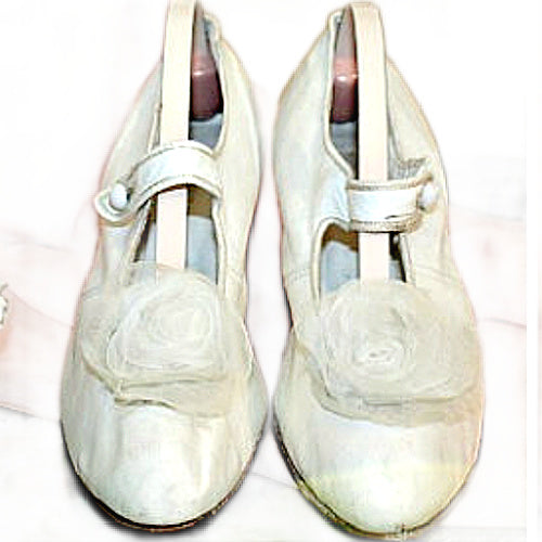Rare antique  white leather bridal shoes adorned with ethereal chiffon roses. Romantic historic wedding footwear, beautifully preserved.