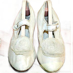 Rare antique  white leather bridal shoes adorned with ethereal chiffon roses. Romantic historic wedding footwear, beautifully preserved.