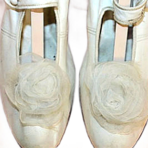 Rare antique  white leather bridal shoes adorned with ethereal chiffon roses. Romantic historic wedding footwear, beautifully preserved.