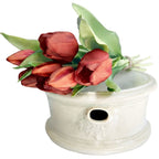 Antique 19th-century French ironstone cuspidor with distinctive two-spout silhouette with red tulips
