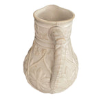 English Gothic revival relief molded pitcher with applied handle detail