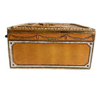 Side view showing guilloché enamel and gilt-metal decoration