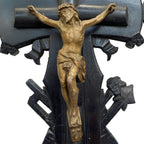 Close-up of antique 19th century French ebonized wood crucifix with detailed bronze Corpus of Christ