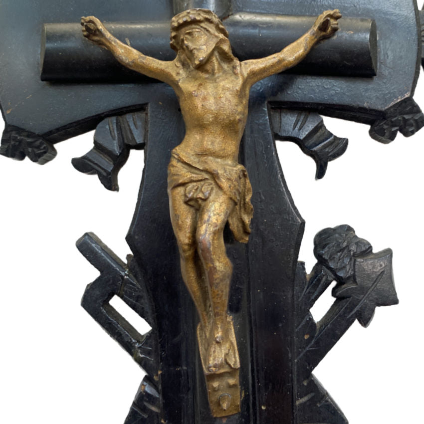 Close-up of antique 19th century French ebonized wood crucifix with detailed bronze Corpus of Christ