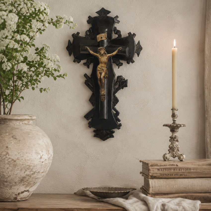 Antique French devotional crucifix displayed in an elegant European home