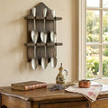 Early 19th century French pewter spoon set styled in rustic kitchen interior
