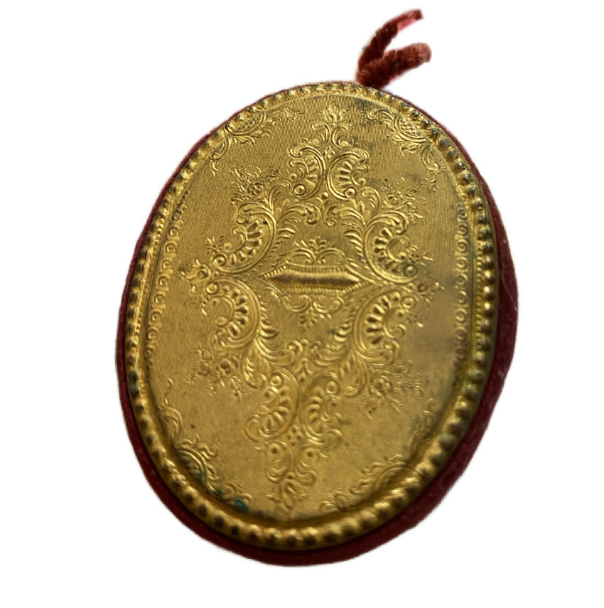 Close detail of Palais Royale gilt pin keeper inside Victorian sewing box back view