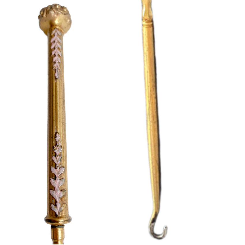 Apollo Studios button hook with intricate enamel and gold plating, early 1900s