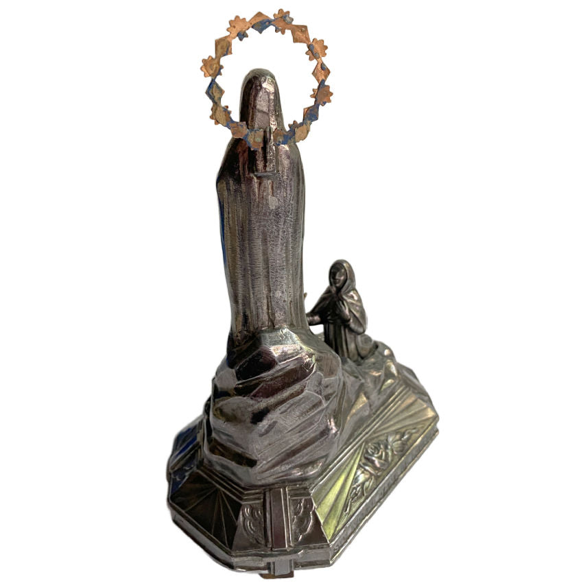 Back of antique French Lourdes Virgin Mary figure, showing gilded halo and delicate dark art deco metal detailing
