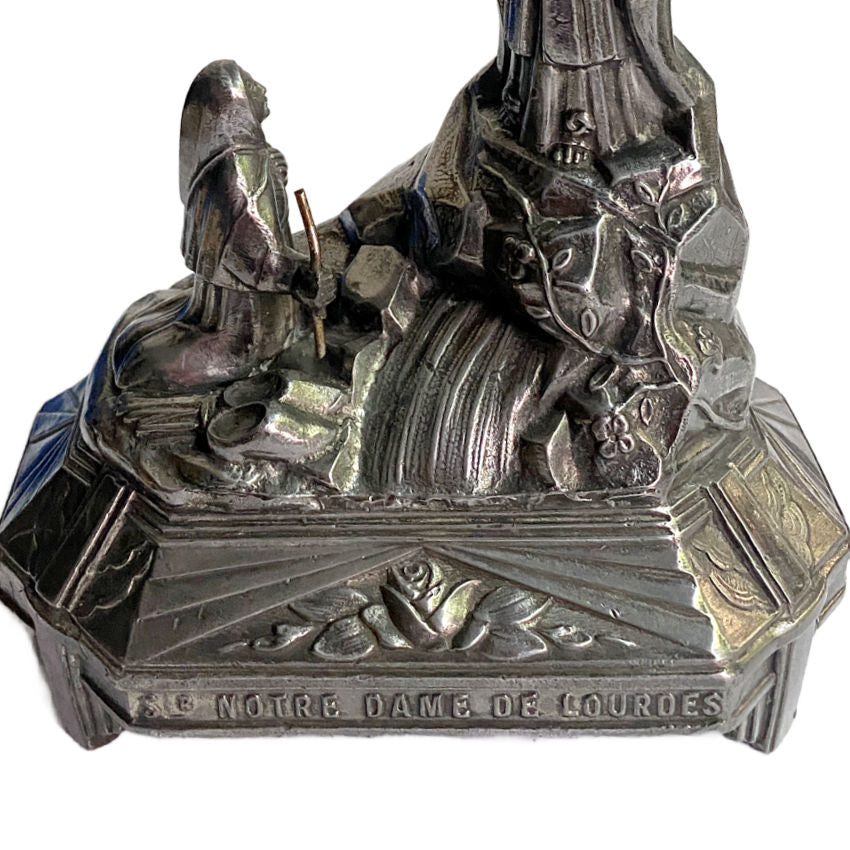 Base of antique French metal Lourdes statue, DSR-attributed, featuring Virgin Mary in serene pose, Art Deco base design.