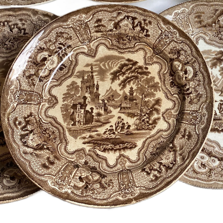 Decorative antique Scottish plate with intricate brown and white Transferware design 