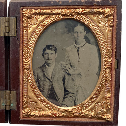Rare Civil War era Union Case with ship’s wheel motif, retaining original portraits of a couple and elder woman. A deeply personal and historic collector’s treasure.