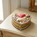 Antique English shellwork souvenir box styled on a dressing table