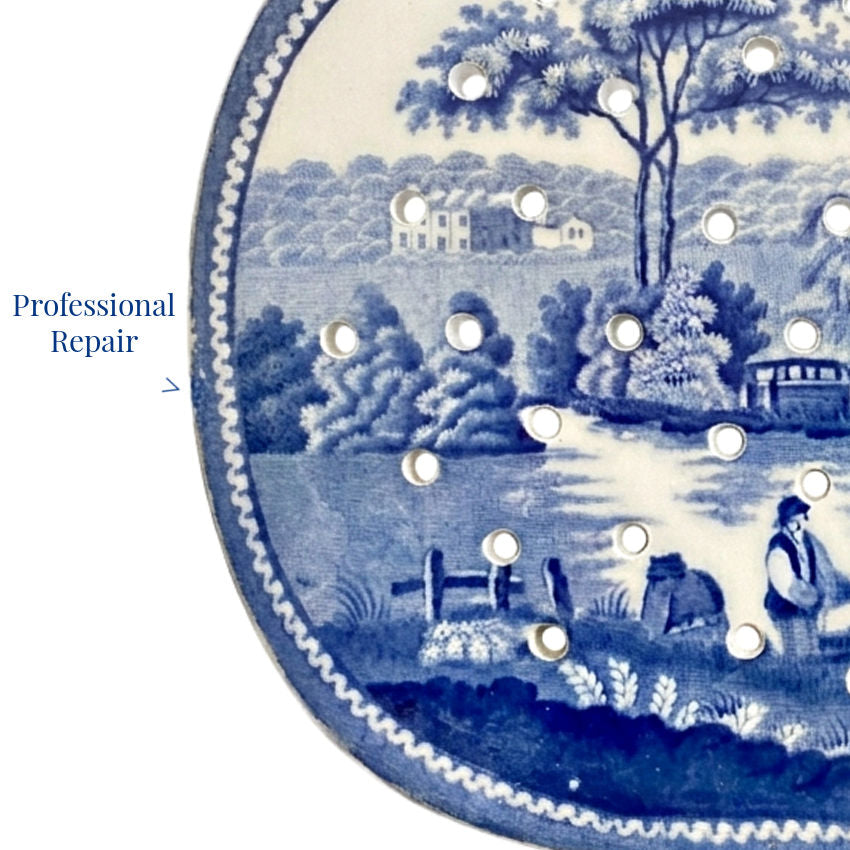 close detail of cobalt transferware pattern on antique english ironstone meat drainer