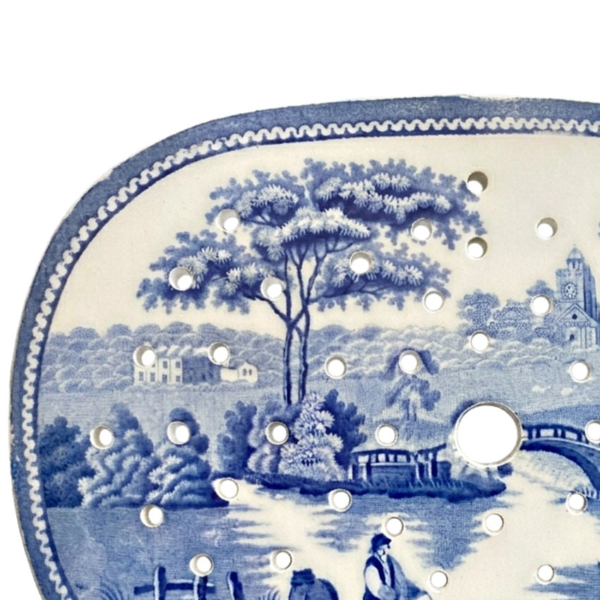 Detail of 19th century antique english blue and white ironstone meat drainer