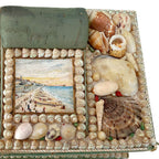 Antique shellwork sewing box with green silk-covered pincushion
