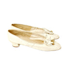 Rare circa 1850 Antique French white kid leather wedding shoes adorned with delicate wax flowers. Exquisite mid-19th century bridal footwear.