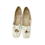 Rare circa 1850 Antique French white kid leather wedding slippers adorned with delicate wax flowers. Exquisite mid-19th century bridal footwear.