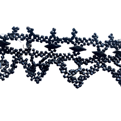 Antique French black glass beaded trim on wire, intricate jet-style lattice passementerie from the 19th century, ideal for couture, display, or textile art collections.