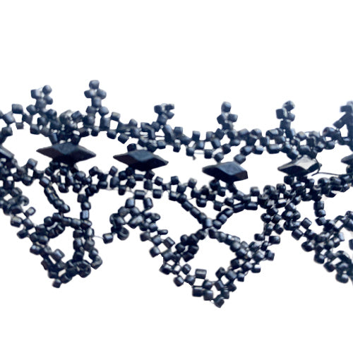 Antique French black glass beaded trim on wire, intricate jet-style lattice passementerie from the 19th century, ideal for couture, display, or textile art collections.