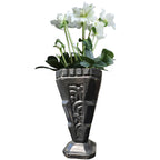 Antique French Art Deco cast iron floral urn with black enamel patina with white helleborous plant with flowers