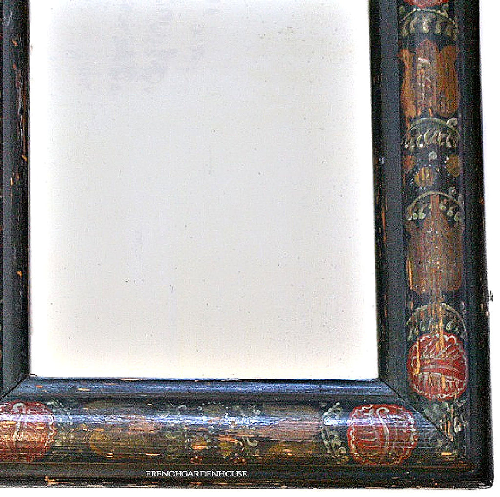 Antique courting mirror showing softly aged glass with subtle ghosting and patina