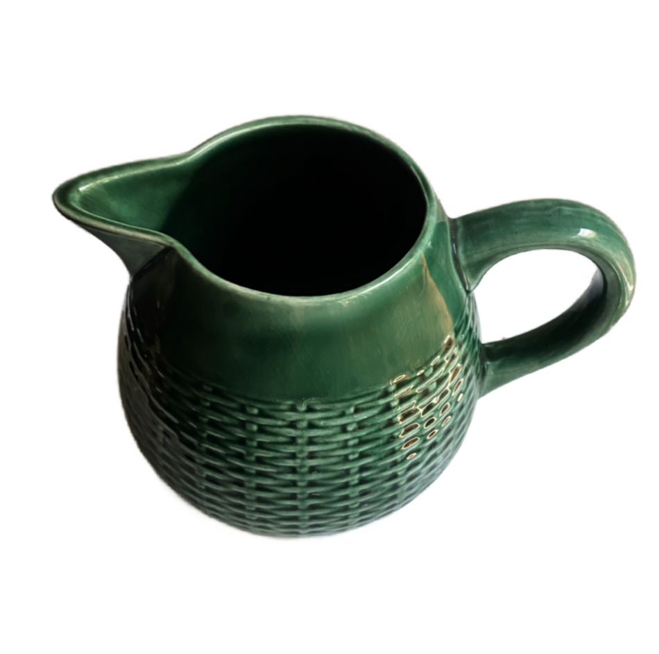 Detail of molded basketweave and green glaze on antique French majolica pitcher top