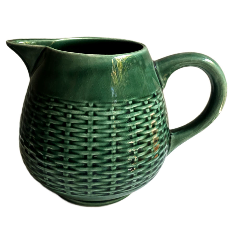 Antique French green majolica pitcher showing molded basketweave pattern