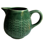 Antique French green majolica pitcher showing molded basketweave pattern