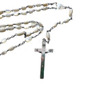Close up luminous mother of pearl rosary beads antique devotional jewelry