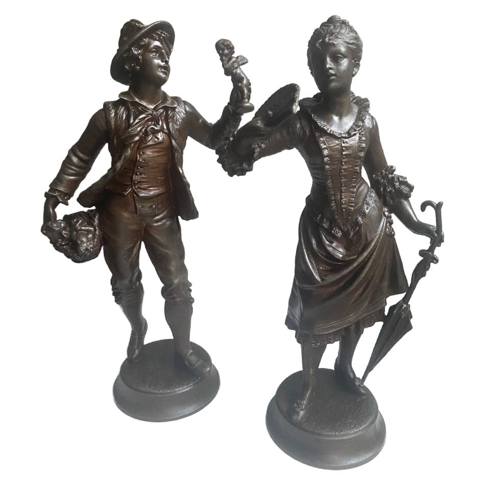 Antique French peddler and young woman with fan metal figures