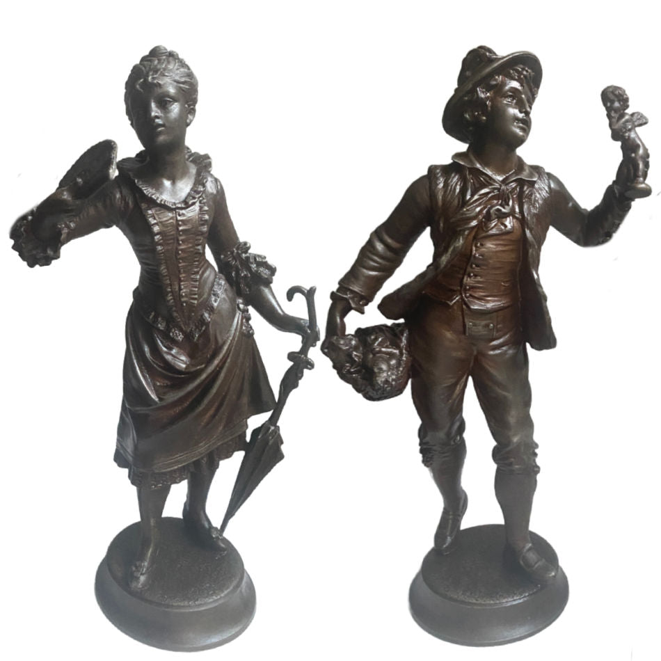 Antique French peddler of dolls and young woman with fan figures