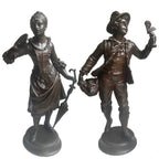 Antique French peddler of dolls and young woman with fan figures