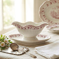 Styled antique St. Amand sauce boat on an elegant French country table