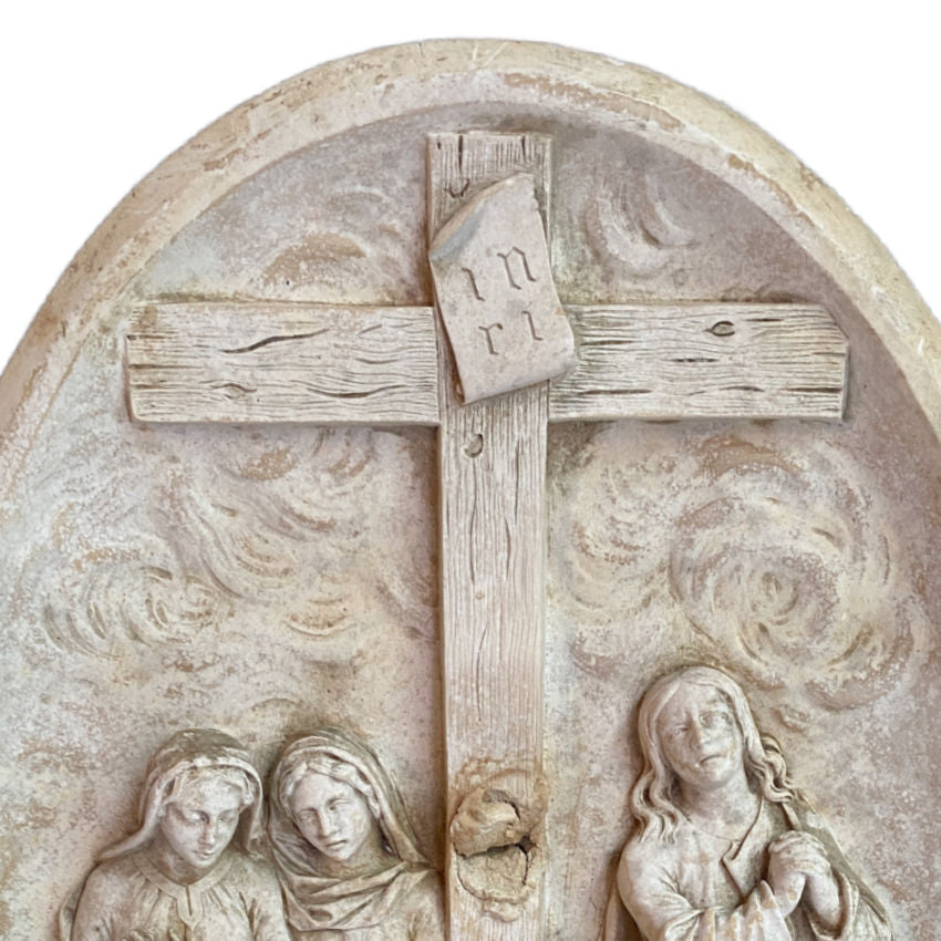 Detailed crucifix scene in antique French oval plaster devotional plaque