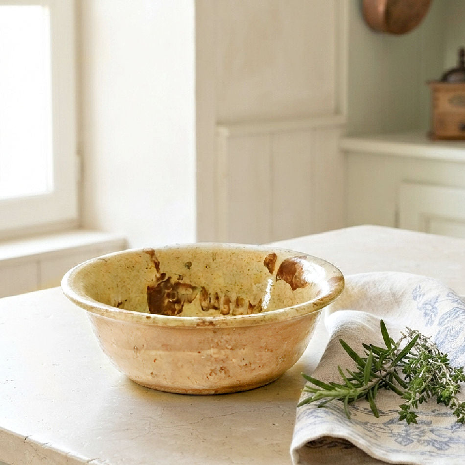 Styled antique French Savoie pottery bowl in a French country kitchen