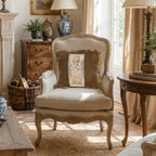 Antique silk velvet pillow with a bullion tapestry fragment and heavy gold bullion trim, featuring a brown velvet background and gold tassels styled on a bergere chair