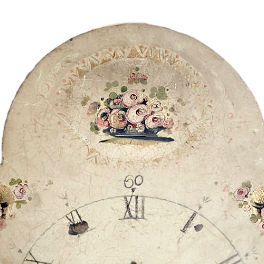 romantic antique clock face with painted roses and patina