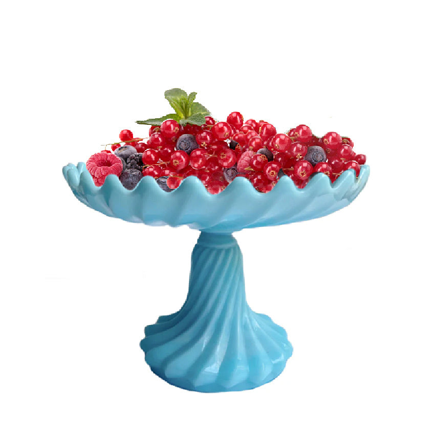 A French antique turquoise blue opaline swirled cake pedestal with scalloped top, displayed with an assortment of berries on top.