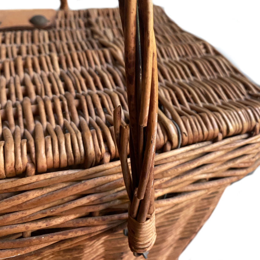 Handwoven French willow basket with swing handles detail of break