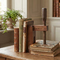 Antique French wooden carpenter’s bench vise by M. Mercier in library