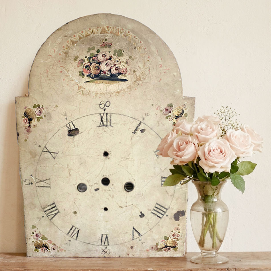 Antique pink roses clock dial displayed with blush roses