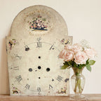Antique pink roses clock dial displayed with blush roses