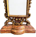 Elegant antique standing mirror with hand carved cherubs and aged gilt finish base painting
