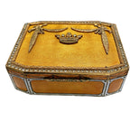 Close-up of guilloché enamel and paste stones on antique European box with crown top